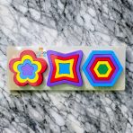 Triplet Geometric Shapes Puzzle with colorful wooden circles, triangles, and squares on a wooden board
