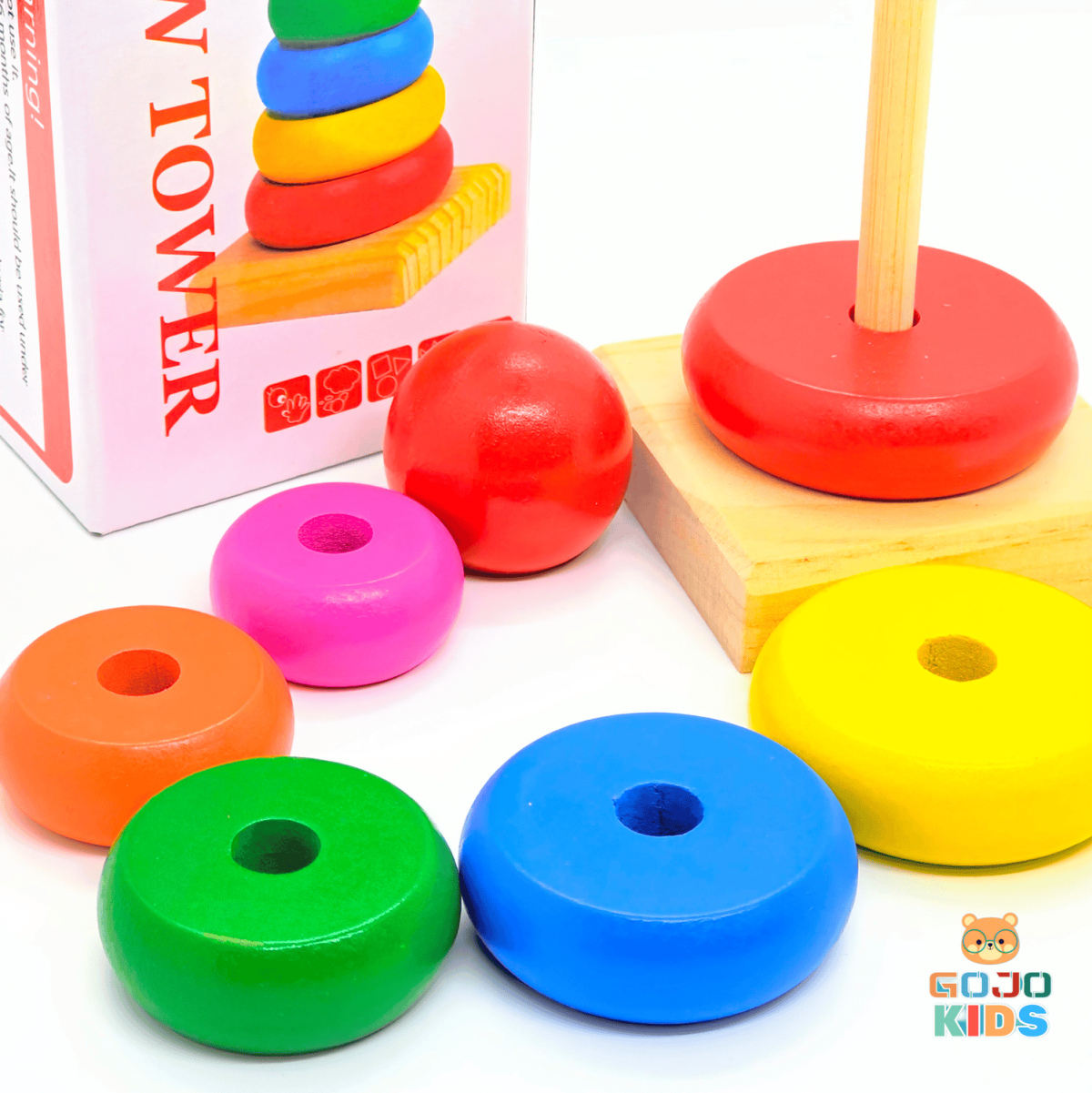 Wooden Rainbow Tower Stack with colorful rings and a wooden base for toddler skill development