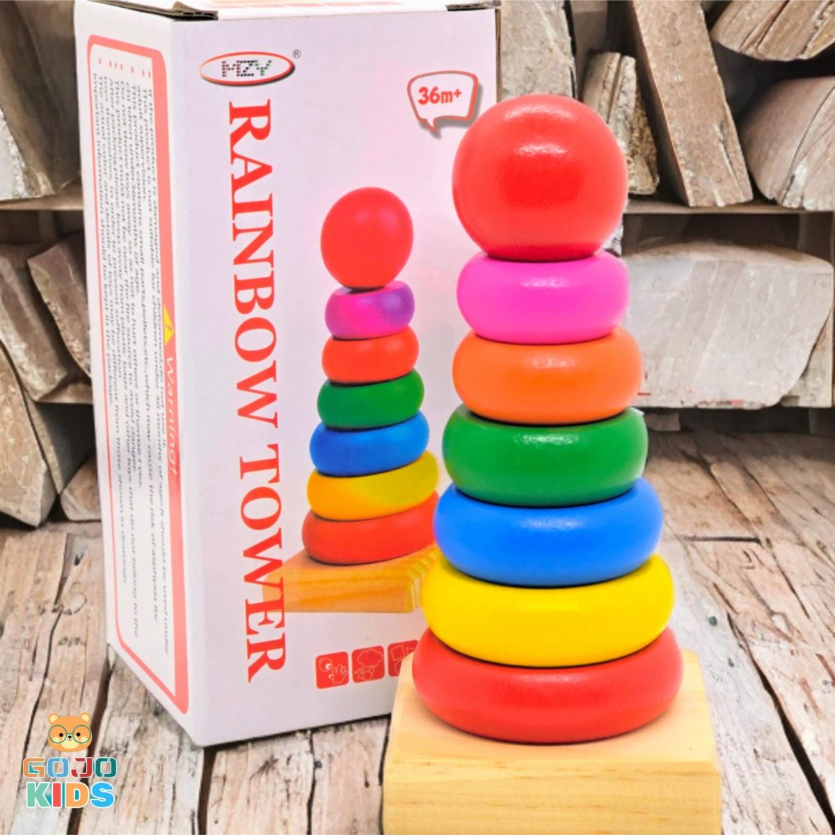 Wooden Rainbow Tower Stack with colorful rings and a wooden base for toddler skill development