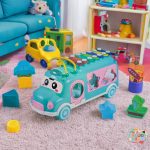Xylophone Music Bus with colorful keys, shape sorting windows, and geometric blocks for early learning